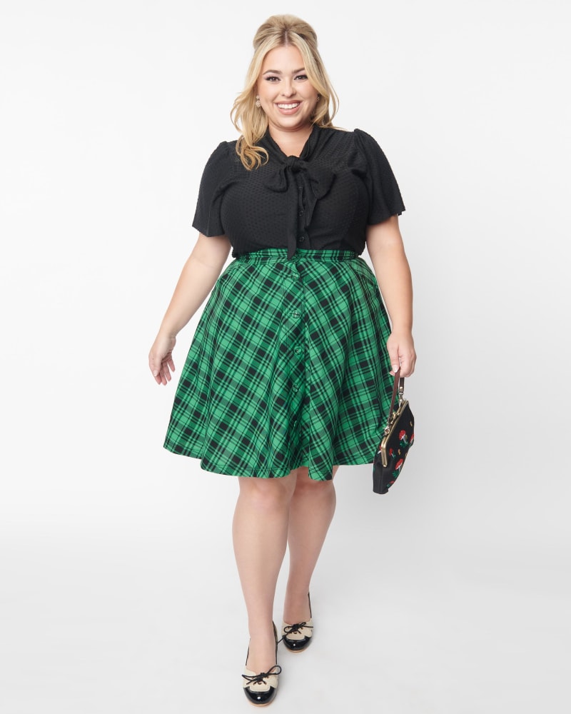 Front of a model wearing a size 1X Unique Vintage Green & Black Plaid Swing Skirt in Green by Unique Vintage. | dia_product_style_image_id:306007